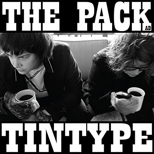 Black and white album cover with two men holding coffee mugs.