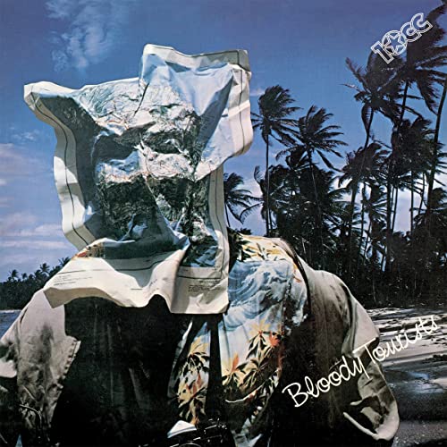 10cc’s “Bloody Tourists” album cover: person obscured by maps, palm trees.