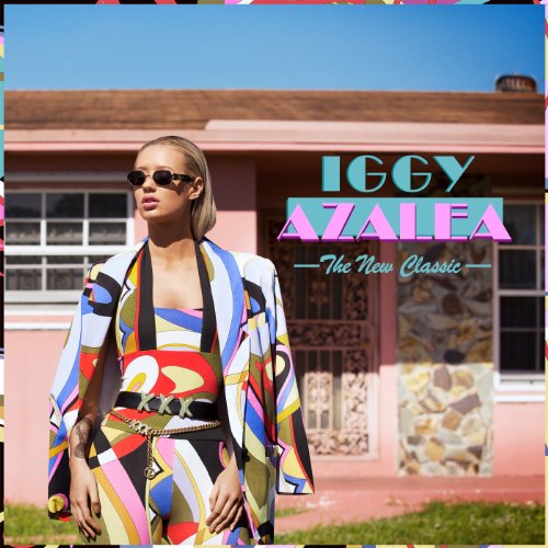 Album cover: Iggy Azalea standing in front of a pink house, wearing colorful outfit.