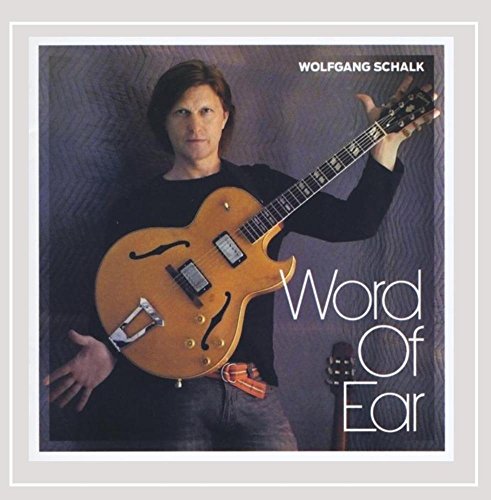 CD cover featuring guitarist Wolfgang Schalk with his instrument.