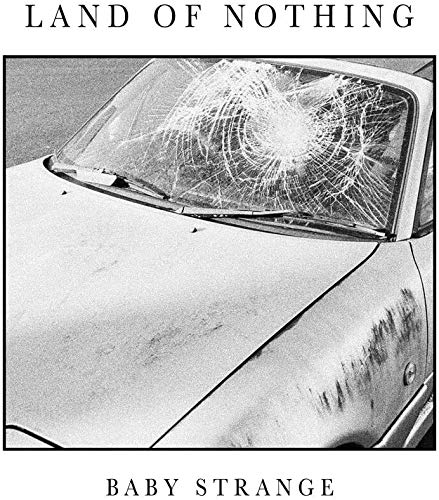 Black and white album cover featuring a car with a cracked windshield.