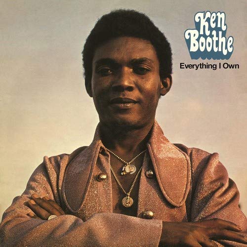 "Ken Boothe album cover featuring a man with crossed arms and a gold jacket."