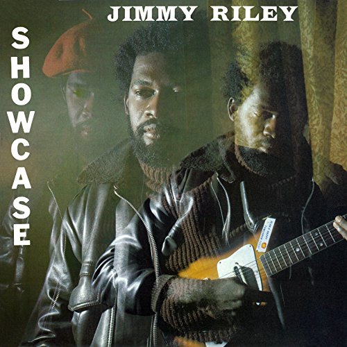 Vinyl album cover featuring three men, one holding a guitar, with "Jimmy Riley Showcase" text.