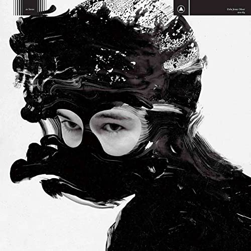Vinyl record cover for Zola Jesus’ OKOVI, with distorted face art.