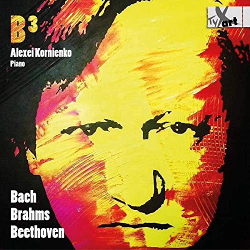 A CD cover featuring a yellow, red, and pink abstract face on a black background.
