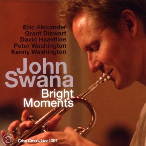 Album cover: man playing trumpet, with artist and album name in bold text.