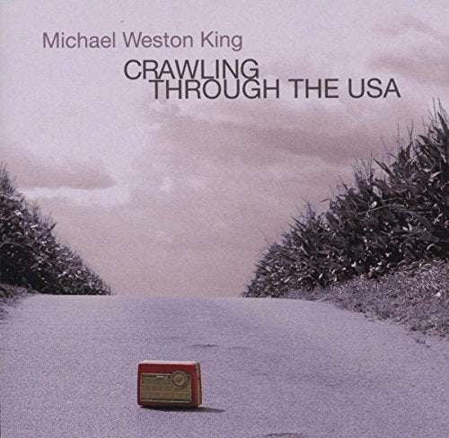 "Album cover with a red radio on an empty road."