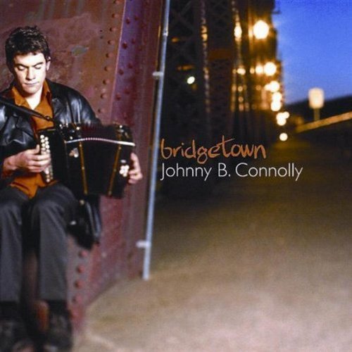 "Album cover with man playing accordion, cityscape in background, 'bridgetown' and 'Johnny B. Connolly' text."
