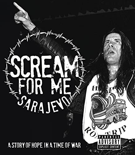 DVD cover: Man singing into microphone with barbed wire and text.