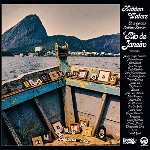 CD cover: Rio de Janeiro landscape with a boat displaying framed photos.