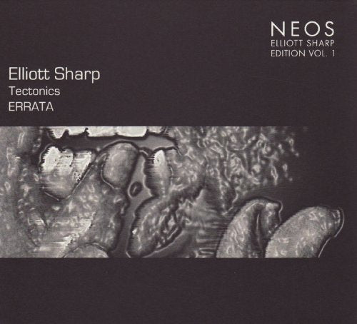 Dark grey album cover with abstract black and white image and white text.