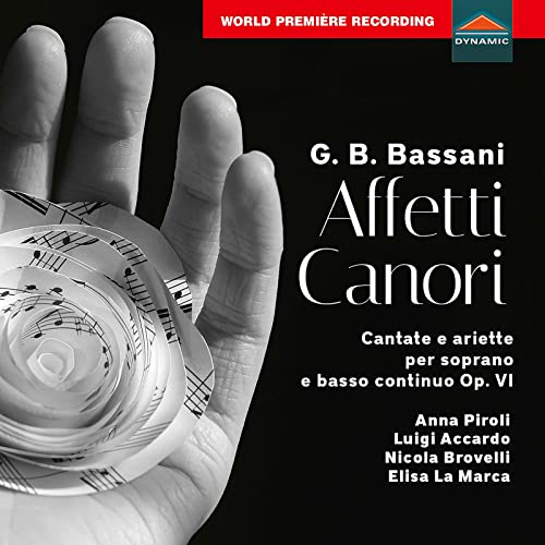 CD cover with a hand holding a paper flower made of sheet music.
