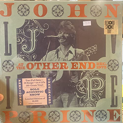 John Prine album cover: portrait of a man with a guitar, 1975.