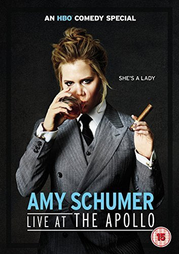 DVD case for "Amy Schumer: Live At The Apollo" with a comedian's image on the cover.