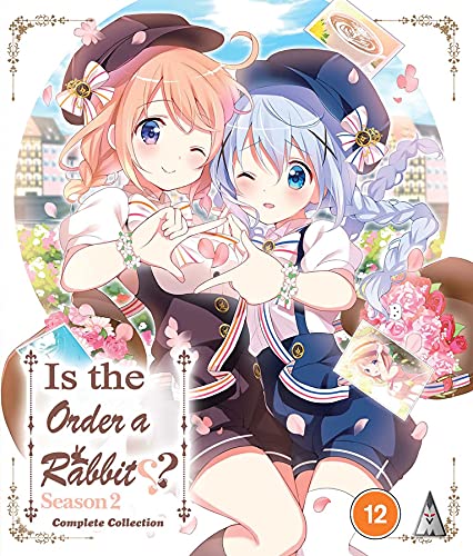 Anime cover art featuring two young girls in sailor outfits and hats.