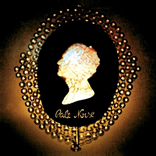Oval frame with a silhouette of a face and the text "Pale Noise".
