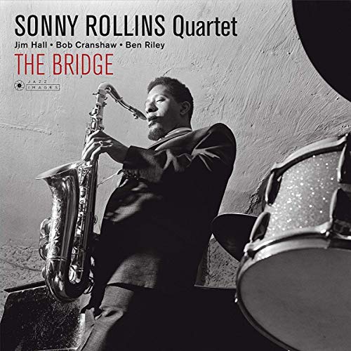 Sonny Rollins album cover, black and white, showing a saxophonist and drums.