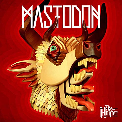 Mastodon album cover: stylized animal head with large horns on red background.