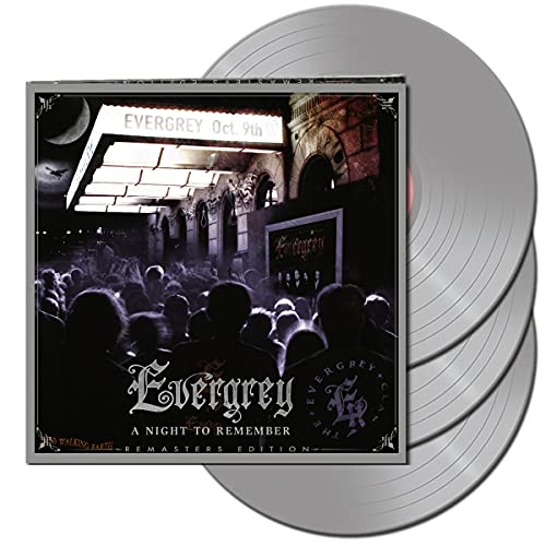 Silver vinyl records with album cover depicting a theater and crowd.