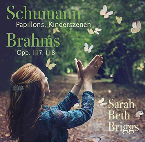Woman in blue dress releasing butterflies in a forest, classical music album cover.