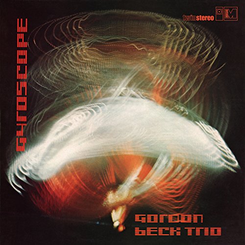 Album cover for Gordon Beck Trio’s “Gyroscope” with abstract, swirling red and white imagery.