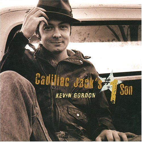 Album cover featuring a man in a hat and denim jacket sitting by a truck.