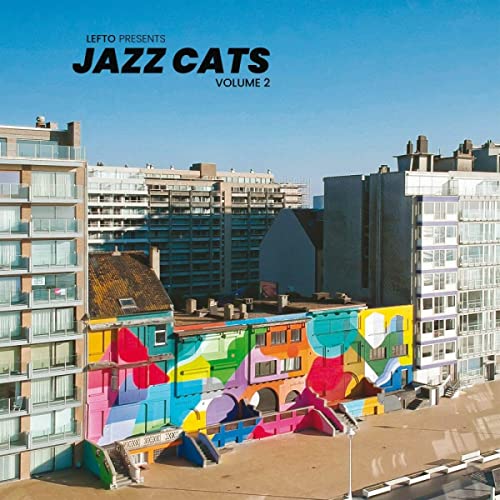 CD cover with colorful building mural and city skyline background.