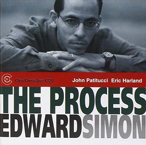 Album cover with a man resting his chin on his hands, titled "The Process" by Edward Simon.