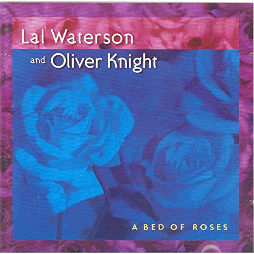 "CD cover with blue roses on purple background, featuring artist names and album title."