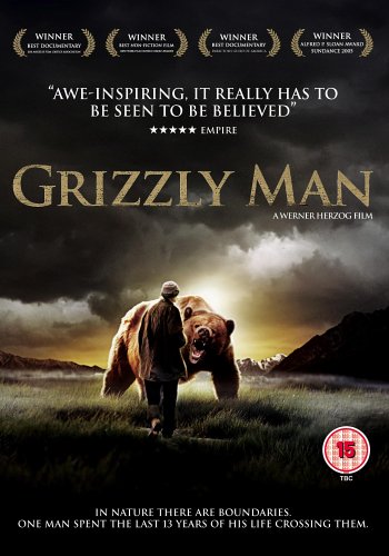 DVD cover for “Grizzly Man” depicting a man facing a large grizzly bear.