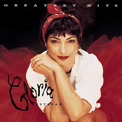 Gloria Estefan’s “Greatest Hits” CD cover with a red background.