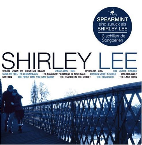 "Album cover with 'SHIRLEY LEE' title, couple on a bridge, and track list."