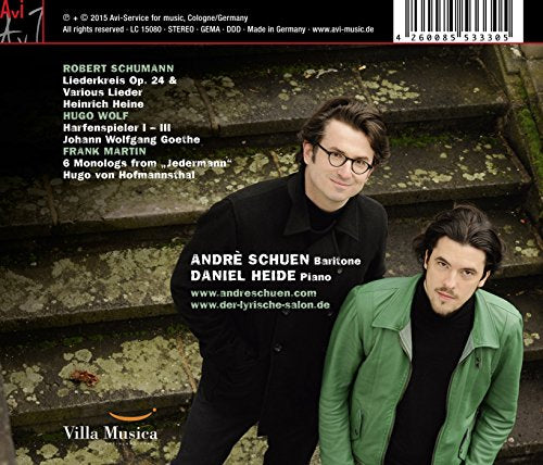 "Album cover featuring two men, one in green jacket, standing outdoors."