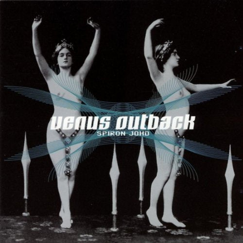 "Album cover with two dancing women in costumes, black background, and abstract blue lines."