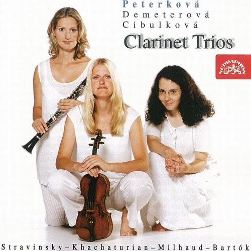 "CD cover featuring three women in white holding musical instruments."