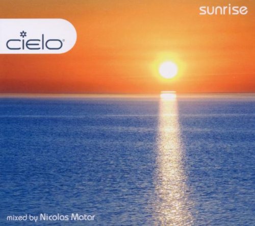 The image depicts a serene sunrise over a body of water, with the sun's reflection visible on the surface. The sky transitions from orange at the top to a lighter shade towards the horizon, where the sun is positioned. The water below is calm and blue, with the sun's reflection creating a pathway of light extending from the horizon to the bottom of the image. In the top-left corner, a white oval contains the text "cielo" in black, accompanied by a small logo resembling a four