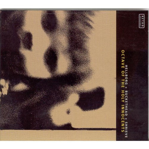 CD cover with a blurred, dark face and text: "Octave Of The Holy Innocents".