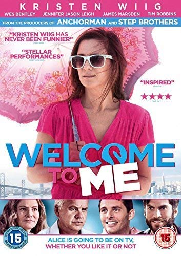 "Movie cover for 'Welcome To Me' featuring Kristen Wiig in pink dress and sunglasses."