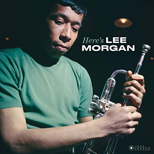 Lee Morgan holding a trumpet, album cover portrait by Francis Wolff.