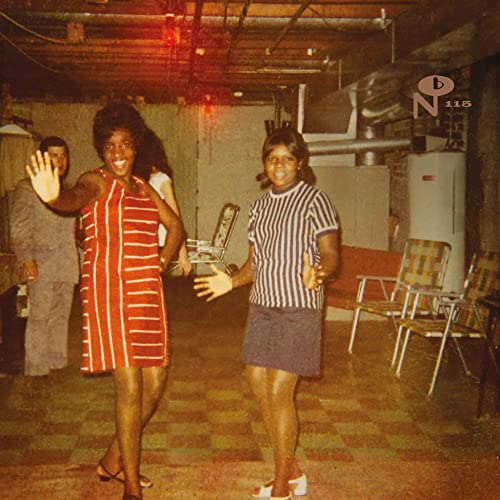 Vintage album cover featuring two Black women and a man in a room.