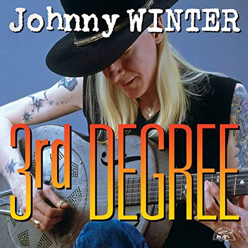 Johnny Winter album cover, featuring a portrait of the musician with his guitar.