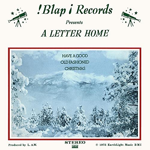 Record album cover with a snowy winter landscape and festive text.