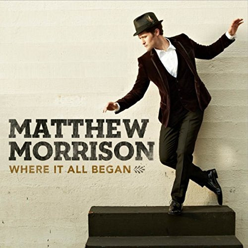 "Album cover with Matthew Morrison stepping on a platform, wearing a suit and hat."