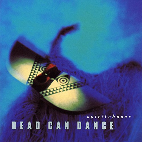 Album cover featuring a patterned mask against a textured, deep blue background.