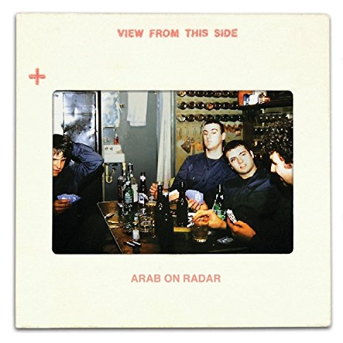 "CD cover with a photo of four men at a bar, surrounded by bottles."