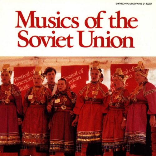 "CD cover featuring six people in traditional red clothing and headdresses."