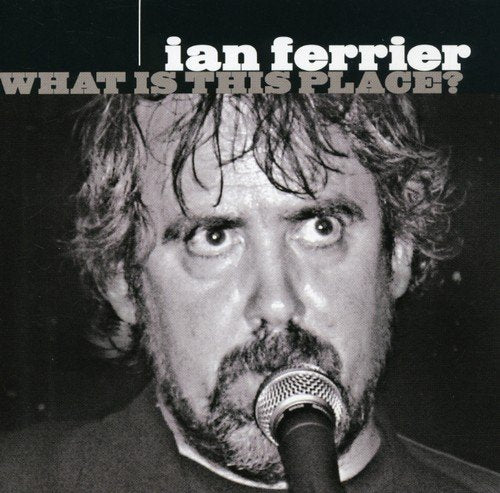 Black and white album cover with a man singing into a microphone.