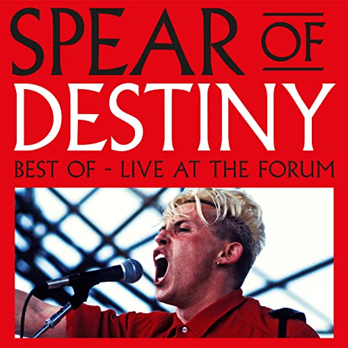 Red album cover featuring a singer performing with a microphone.