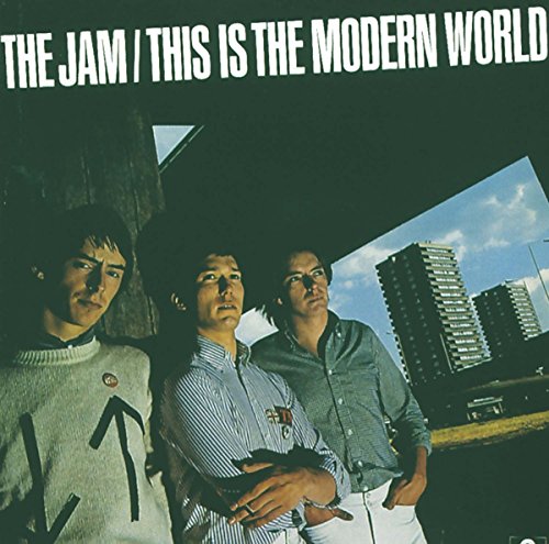 "Album cover 'This Is The Modern World' by The Jam, featuring three band members."