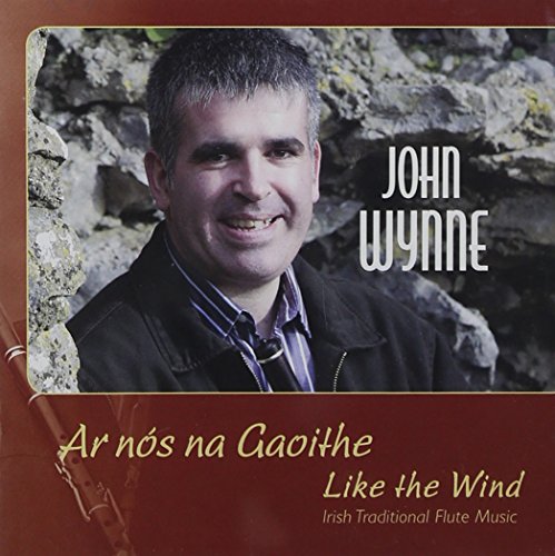CD album cover with a man standing by rocks, text "John Wynne, Like the Wind".